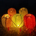 12 Pack Paper Lanterns with LED Lights 6.3 Inch Oval Chinese Decor | Warm lighting effect; Decorative hanging style; Festive party atmosphere; Easy display setup; Creative event accent